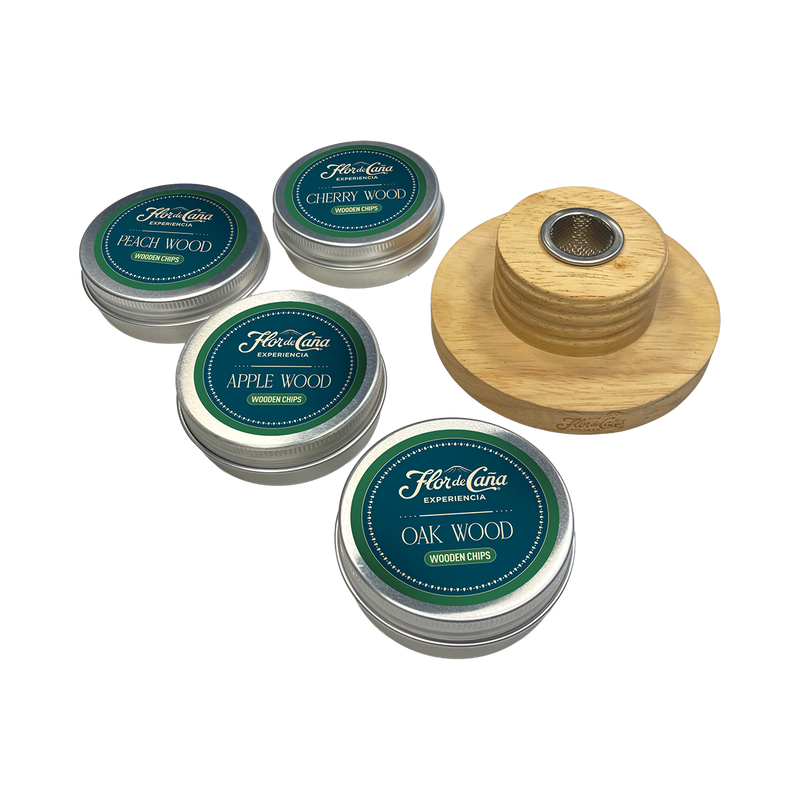 <h2>¡Transforma tus cócteles!</h2>
<p>Dale un toque inigualable a tus bebidas con este maravilloso set de smoke top, que incluye 4 sabores exclusivos para crear una característica única e insuperable en cada trago.</p>
<p>Incluye:</p>
<ul>
<li>Ahumador de madera</li>
<li>Virutas de madera sabor cereza</li>
<li>Virutas de madera sabor durazno</li>
<li>Virutas de madera sabor manzana</li>
<li>Virutas de madera sabor natural</li>
</ul>