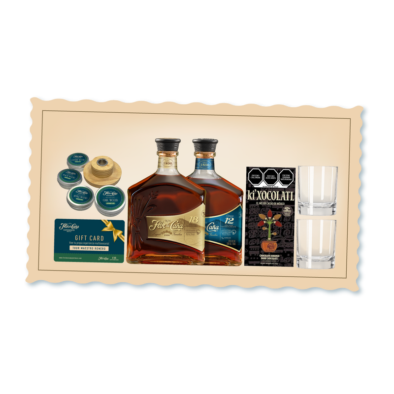 <h3>Descubre una experiencia sensorial completa con esta curación exclusiva que combina el refinamiento del Ron Flor de Caña 12 &amp; 18 años con complementos cuidadosamente seleccionados.</h3>
<p> </p>
<p>Incluye acceso al Tour Maestro Ronero para profundizar en el arte de la destilación, chocolate semi-amargo de 70% para deleitar el paladar, 4 posa vasos de cuero azul, 2 vasos old fashion y un Smoke Top y 4 wood chips de sabores. Una propuesta integral para el conocedor que valora tanto la calidad del espíritu como los detalles que enriquecen la experiencia.</p>
<p> </p>
<p>• Ron Flor de Caña 18 años 750 ml</p>
<p>• Ron Flor de Caña 12 años 750 ml</p>
<p>• Chocolate Semi-Amargo 70%</p>
<p>• Posa vasos de cuero azul</p>
<p>• Set de Ahumador + 4 virutas de madera de sabores</p>
<p>• Set 2 vasos old fashion</p>
<p>• Un cupón para 2 personas para disfrutar de nuestro exclusivo Tour Maestro Ronero.</p>
<p>• Una canasta práctica y hermosa, ideal para reutilizar y guardar más detalles especiales.</p>