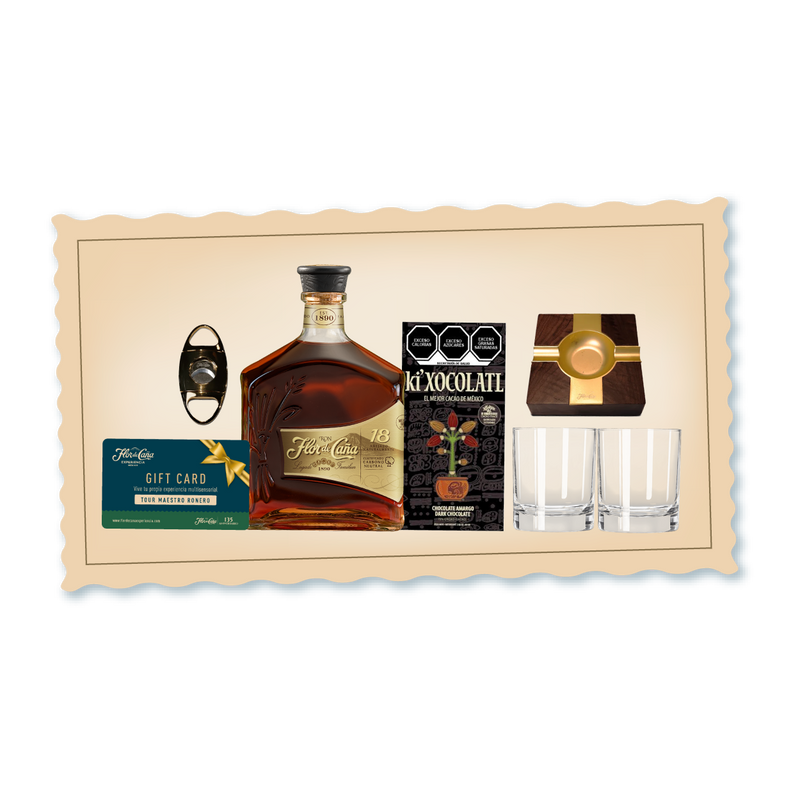 <h3>Descubre una experiencia sensorial completa con esta curación exclusiva que combina el refinamiento del Ron Flor de Caña 12 &amp; 18 años con complementos cuidadosamente seleccionados.</h3>
<p> </p>
<p>Incluye acceso al Tour Maestro Ronero para profundizar en el arte de la destilación, chocolate semi-amargo de 70% para deleitar el paladar, 4 posa vasos de cuero azul, 2 vasos old fashion y un Smoke Top y 4 wood chips de sabores. Una propuesta integral para el conocedor que valora tanto la calidad del espíritu como los detalles que enriquecen la experiencia.</p>
<p> </p>
<p>• Ron Flor de Caña 18 años 750 ml</p>
<p>• Ron Flor de Caña 12 años 750 ml</p>
<p>• Chocolate Semi-Amargo 70%</p>
<p>• Cenicero para cigarros puros</p>
<p>• Cortador de puros doble navaja</p>
<p>• Un cupón para 2 personas para disfrutar de nuestro exclusivo Tour Maestro Ronero.</p>
<p>• Una canasta práctica y hermosa, ideal para reutilizar y guardar más detalles especiales.</p>