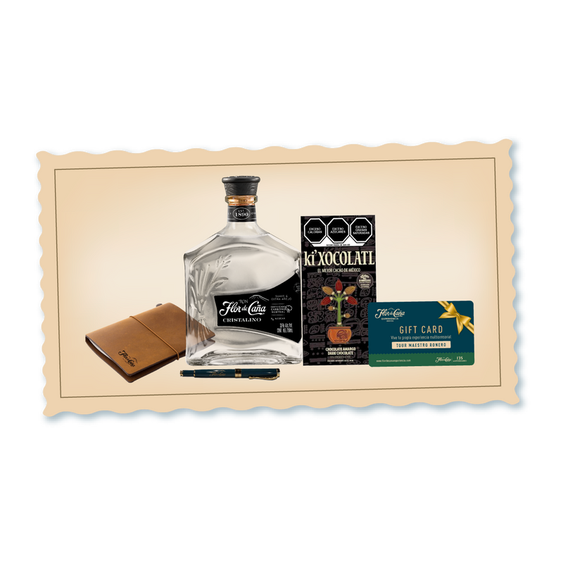 <h3><span style="color: rgb(0, 61, 77);">Descubre una experiencia sensorial completa con esta curación exclusiva que combina el refinamiento del Ron Flor de Caña Cristalino con complementos cuidadosamente seleccionados.</span></h3>
<p> </p>
<p>Incluye acceso al Tour Maestro Ronero para profundizar en el arte de la destilación, chocolate semi-amargo de 70% para deleitar el paladar, una libreta de viaje para documentar tus momentos y una pluma de diseño. Una propuesta integral para el conocedor que valora tanto la calidad del espíritu como los detalles que enriquecen la experiencia.</p>
<p> </p>
<p>• Ron Flor de Caña Cristalino 750 ml</p>
<p>• Chocolate Semi-Amargo 70%</p>
<p>• Travel note book</p>
<p>• Pluma</p>
<p>• Un cupón para 2 personas para disfrutar de nuestro exclusivo Tour Maestro Ronero.</p>
<p>• Una canasta práctica, ideal para reutilizar y guardar más detalles especiales.</p>
<p> </p>
<p><span style="color: rgb(39, 97, 67);"><strong>Incluye un regalo navideño de Flor de Caña 135 Aniversario.</strong></span></p>